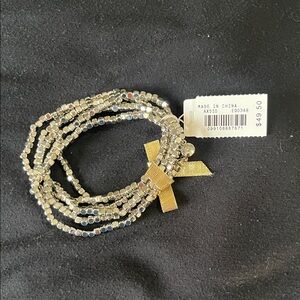 Elegant Silver Beaded Bracelet with Gold Accent